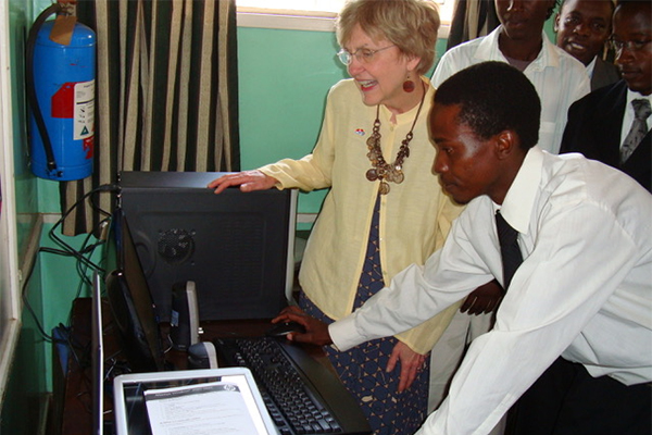 Carolyn Schrader with Rotary members in Zimbabwe